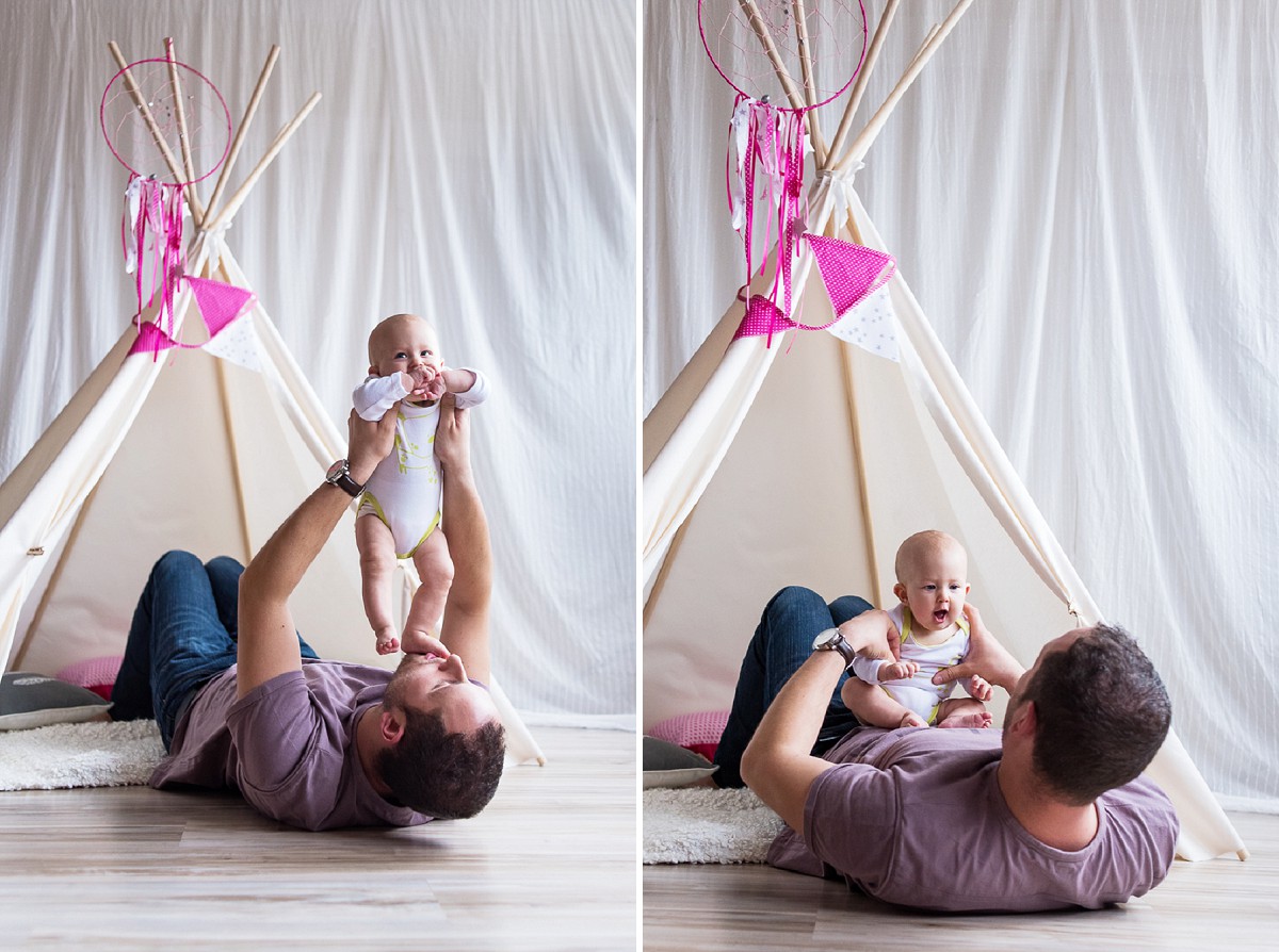 Séance bébé lifestyle photos de famille naturelles - papa qui joue avec bébé des souvenirs qu'il faut conserver